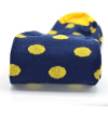 Blue socks with yellow dots